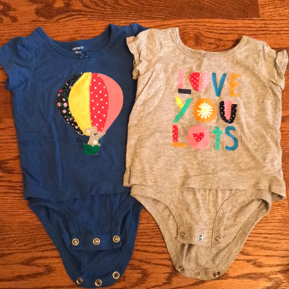 Carter’s 9 month short sleeved onesies
